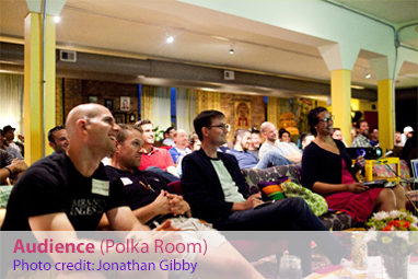 Download a photo of an audience in the Polk Room